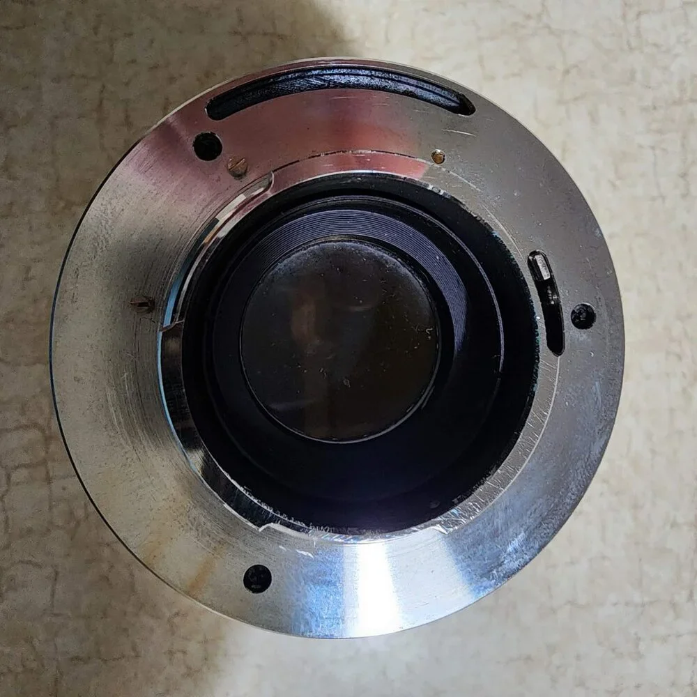 Carenar Camera Lens 1 :2.8 F=135mm No. 7012203 with Hoya Skylight 1A Filter